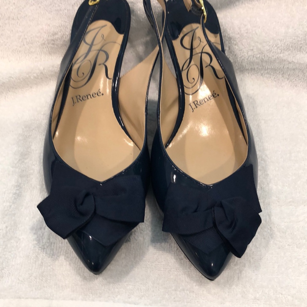 Navy patent leather shoes.
